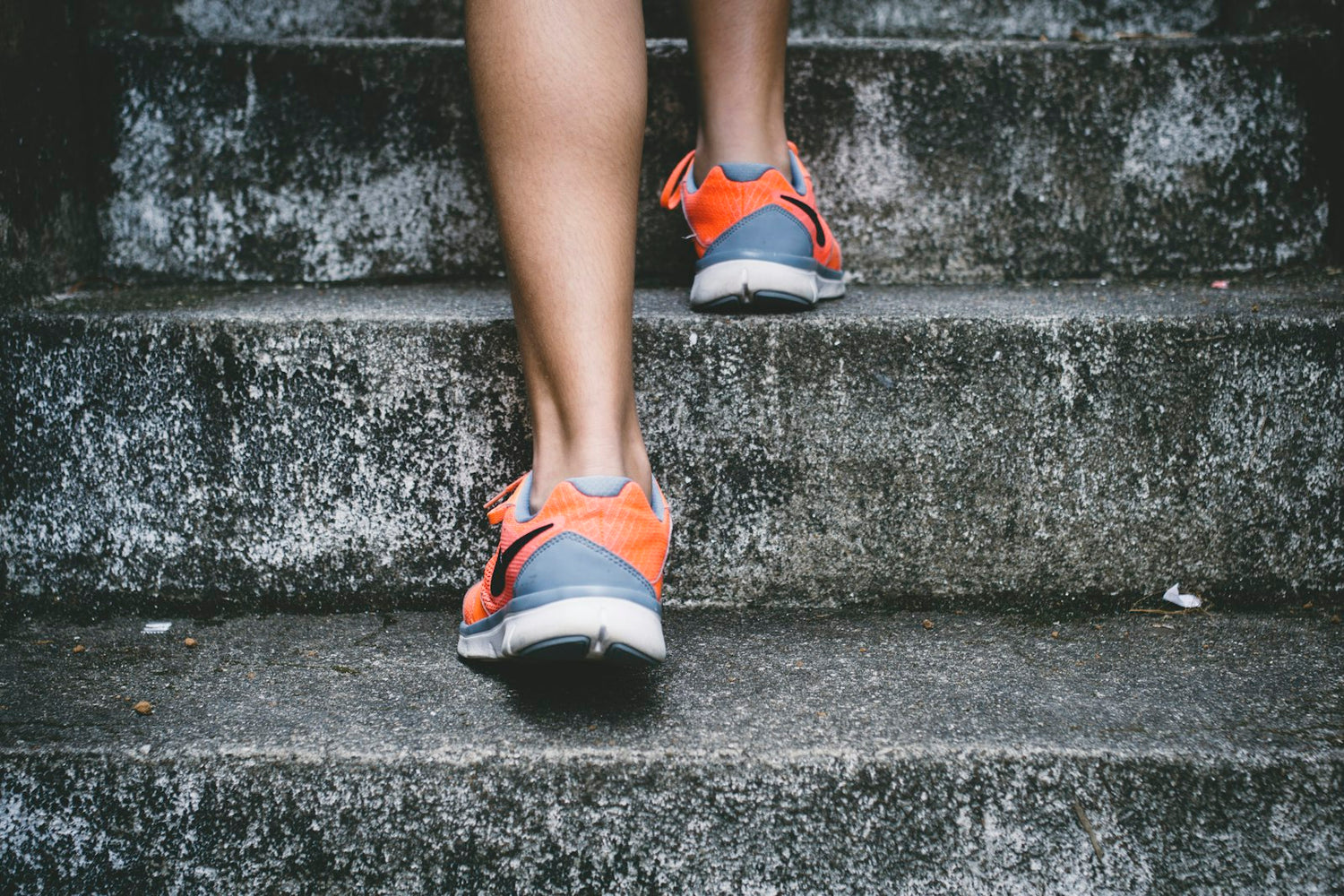 Worn running shoes on steps